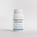 Bottle of Walrus Core Magnesium Glycinate on a light gray background